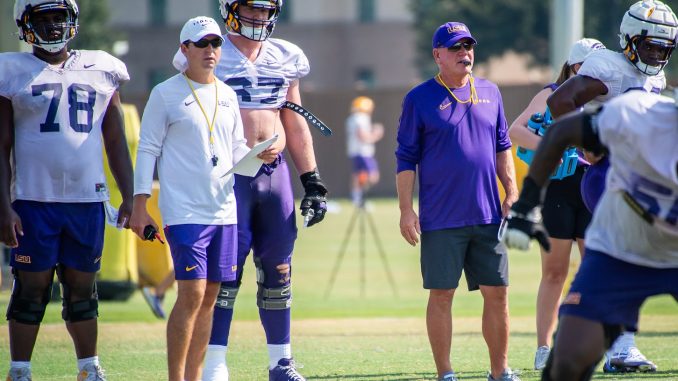 Joe Sloan and Brian Kelly