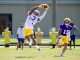 Sage Ryan watches Chris Hilton make a reception during drills on 8-7-2024